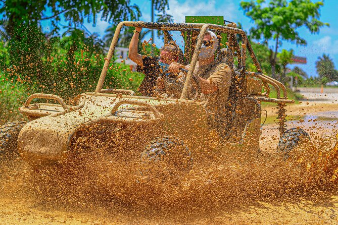 Buggy Tour in Punta Cana with Stops at the Beach and a Cave - Stop 2: Macao Beach Under Limestone Cliffs