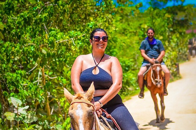 Horseback Riding and ATV or Buggy to Water Cave and Macao Beach - The 25-ft water cave: cool off, jump if it works, and manage crowds