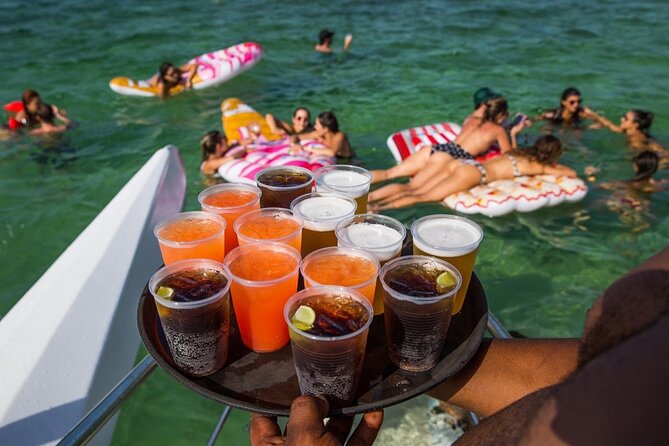 Party Boat /View Dolphins / Snorkling /Free Drinks and Transportation - Snacks and Bathroom Reality: Small Comforts, Uneven Quality