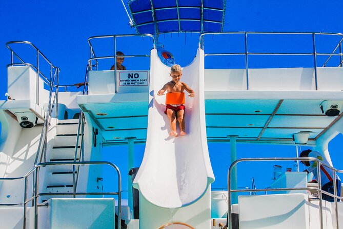 Private Luxury Party Boat with Slide - The 3-hour plan: Bavaro Beach, reef snorkeling, and that natural pool stop