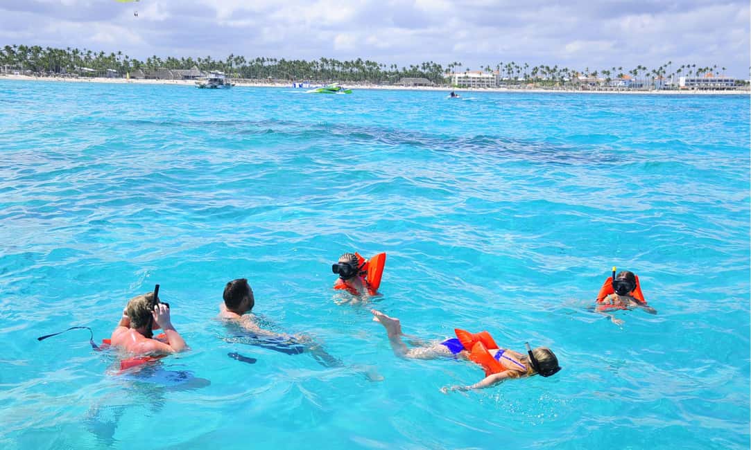 Punta Cana: Catamaran Tour with Reef Snorkeling and Open Bar - Getting to the dock: bus pickup that actually matters
