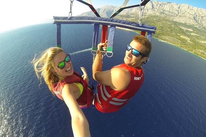 Punta Cana Combo Tour: Snorkeling, Catamaran Cruise & Parasailing - The catamaran party boat: drinks, DJ beats, and the natural pool stop
