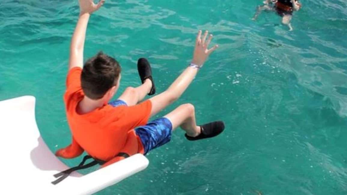 Punta Cana: Party Boat and Snorkeling Adventure - Catamaran cruise vibe: open bar, snacks, and party music