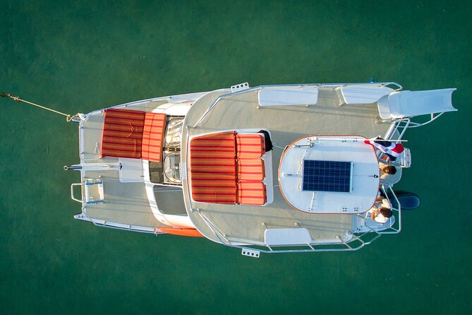 Punta Cana Private Catamaran Cruise with Drinks and Light Snacks - Stop 2: Punta de los Nidos Slide-and-Splash Stop