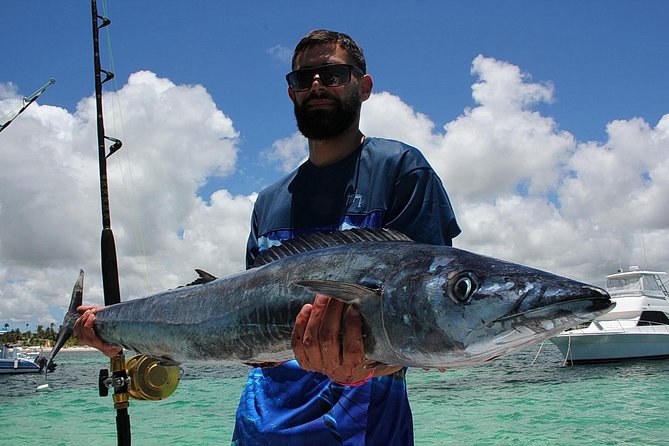 Punta Cana Private Fishing Charter on 39 Foot Boat with Bevarages - Landing fish, filleting help, and getting it cooked