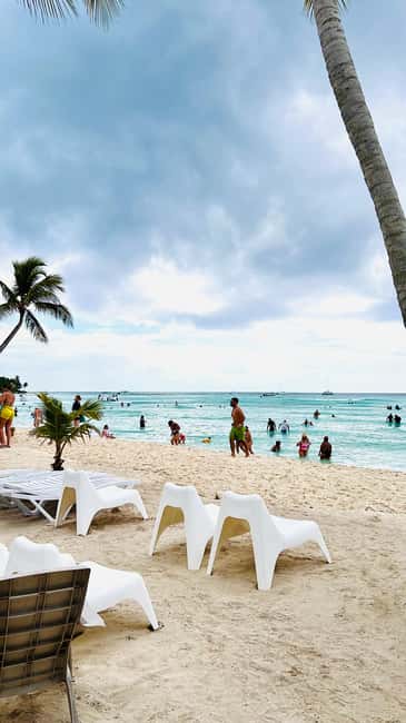 Punta Cana: Saona Island Tour with Lunch and Drinks - Return catamaran: entertainers, music, and the open-bar vibe