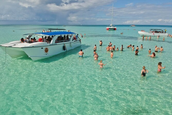 Saona Island Catamaran Adventure with Free Food and Transportation - Return on the Catamaran: Drinks, Snacks, Animation, and Dancing